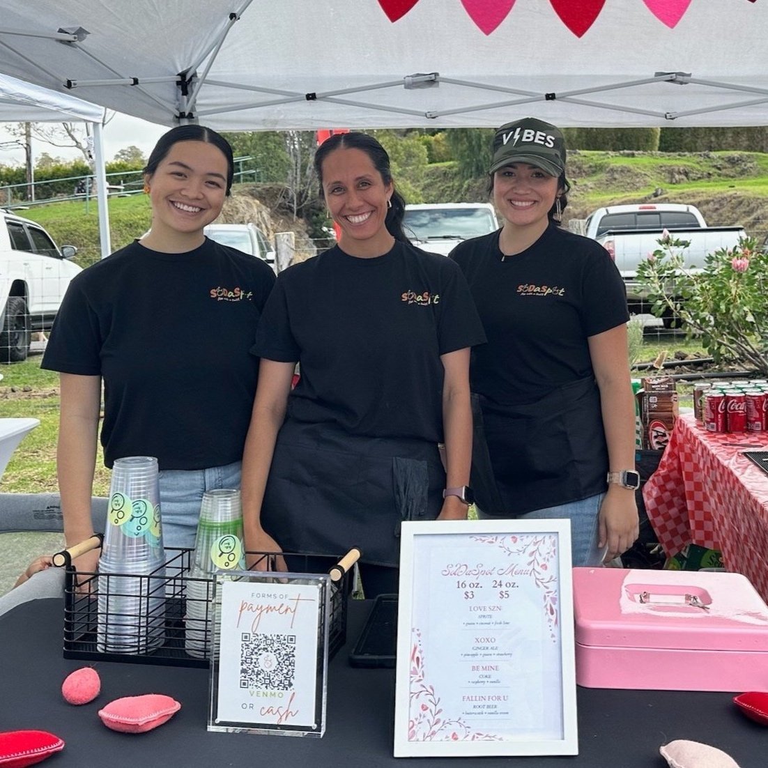 The two owners of SoDaSpot Maui smiling at an event